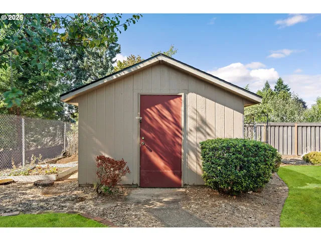 a backyard of a house with lots of green space