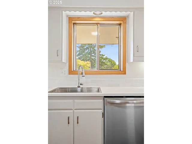 a bathroom with a sink toilet and mirror
