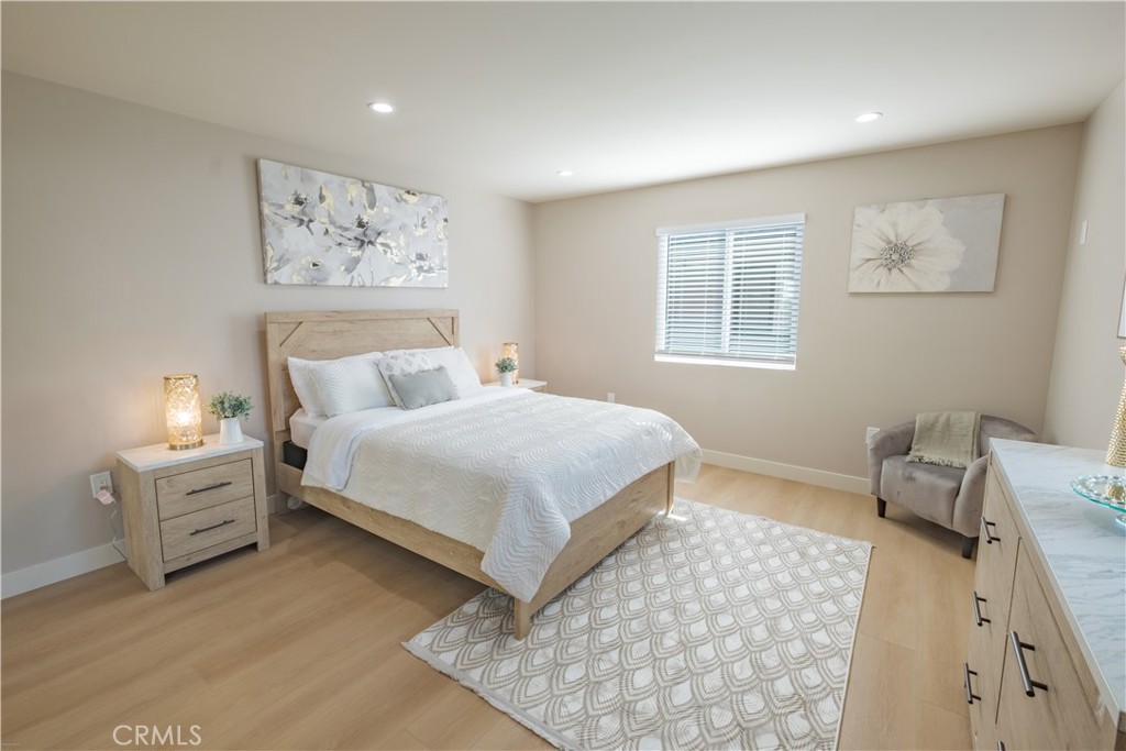 223 South Aprilia Avenue Compton, CA 90220 - Photo 24 of 46 a bedroom with a bed and a window
