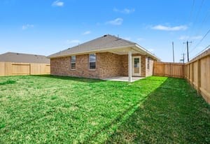 440 Bryan Street Angleton, TX 77515 - Photo 15 of 15 a front view of a house with garden
