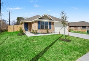 440 Bryan Street Angleton, TX 77515 - Photo 2 of 15 a front view of a house with a yard
