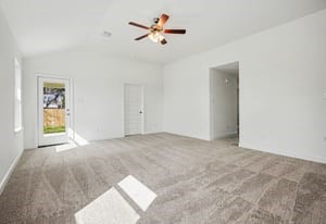440 Bryan Street Angleton, TX 77515 - Photo 3 of 15 a view of a livingroom with a ceiling fan and window