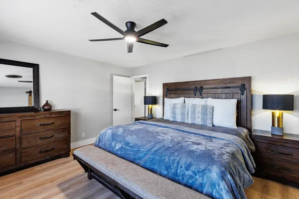 a bedroom with a bed and a large closet