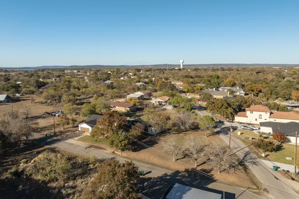 an aerial view of residential building and ocean