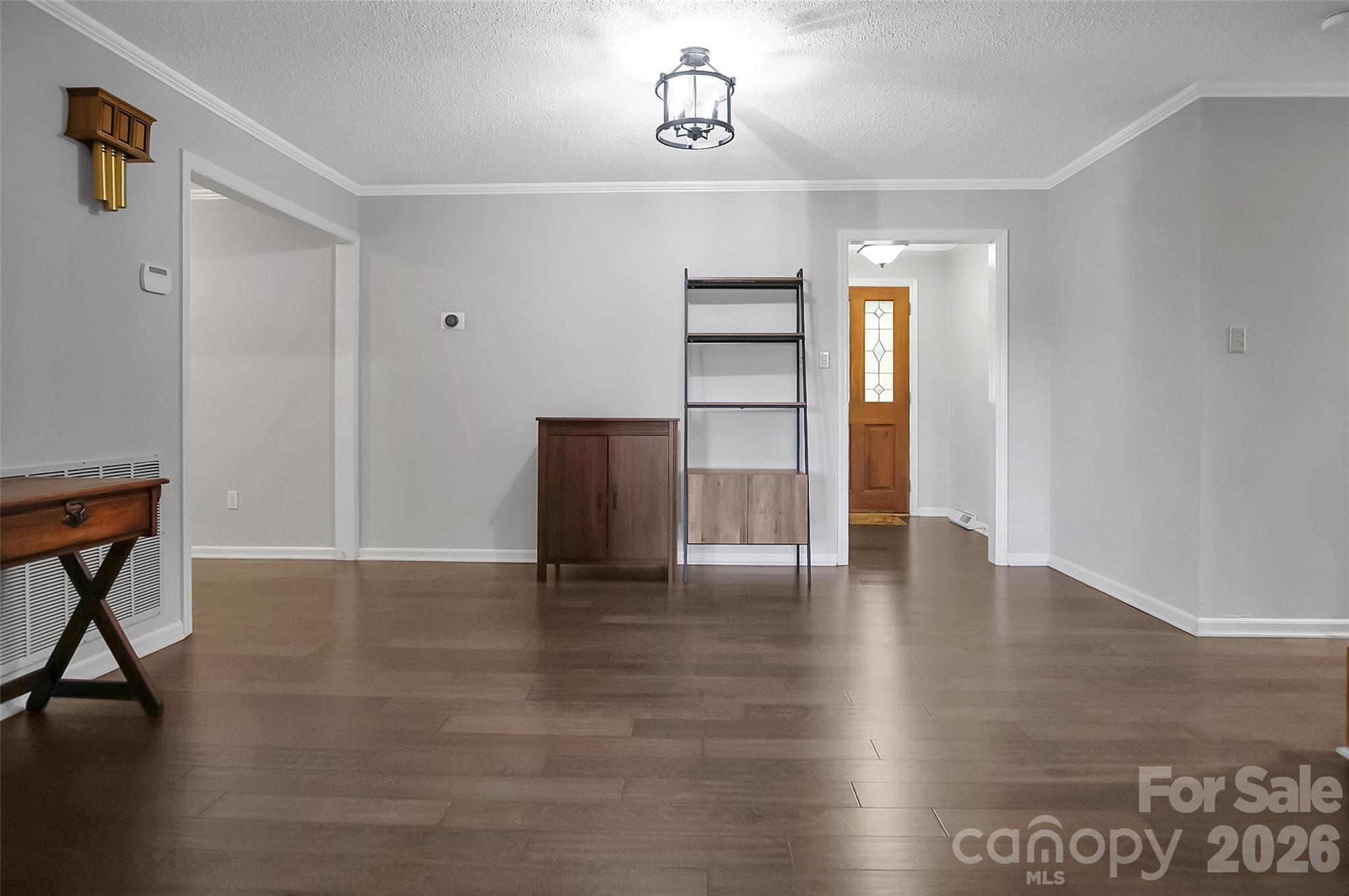 808 Old Mt Holly Road Stanley, NC 28164 - Photo 8 of 48 a view of empty room with wooden floor