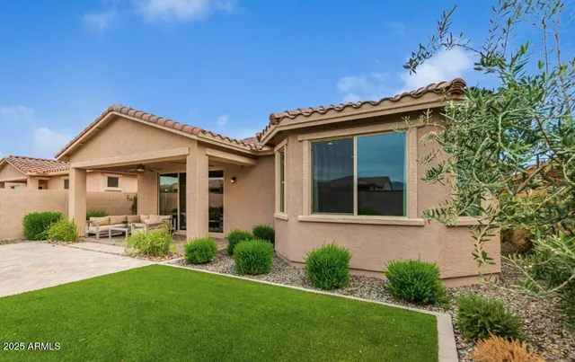 front view of a house with a yard