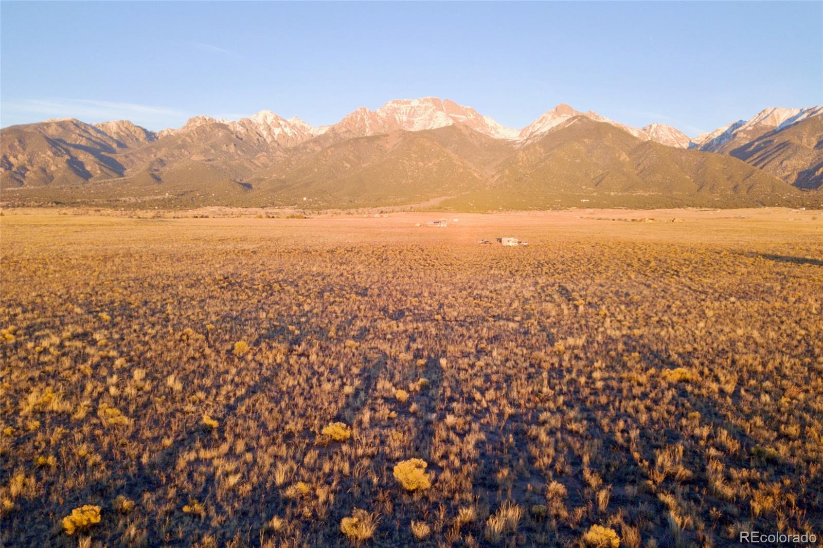 620-621 Pine Cone Road Crestone, CO 81131 - Photo 1 of 16 a view of an ocean from a mountain