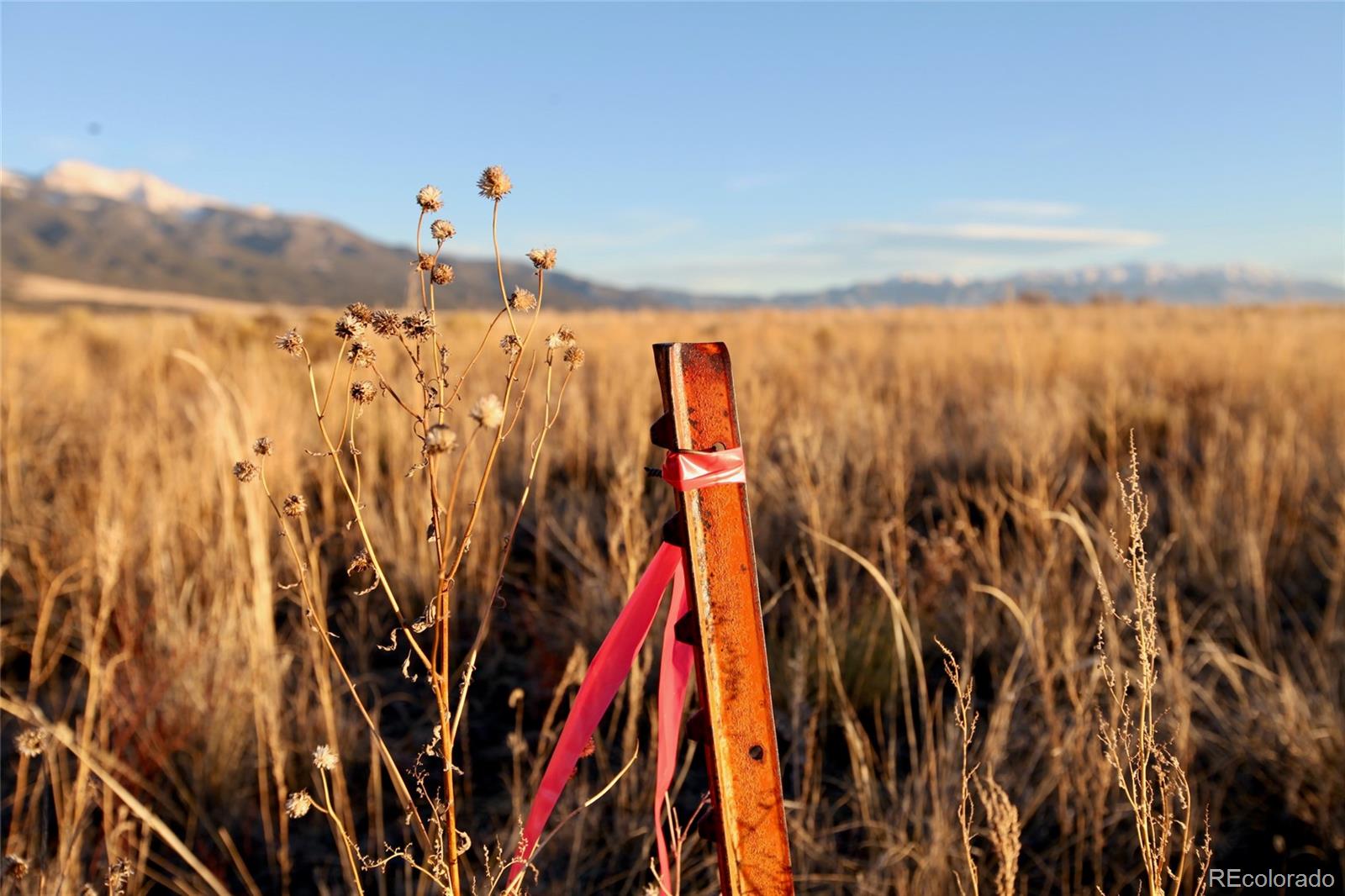 620-621 Pine Cone Road Crestone, CO 81131 - Photo 15 of 16 a view of walk in closet with clothes and shoes