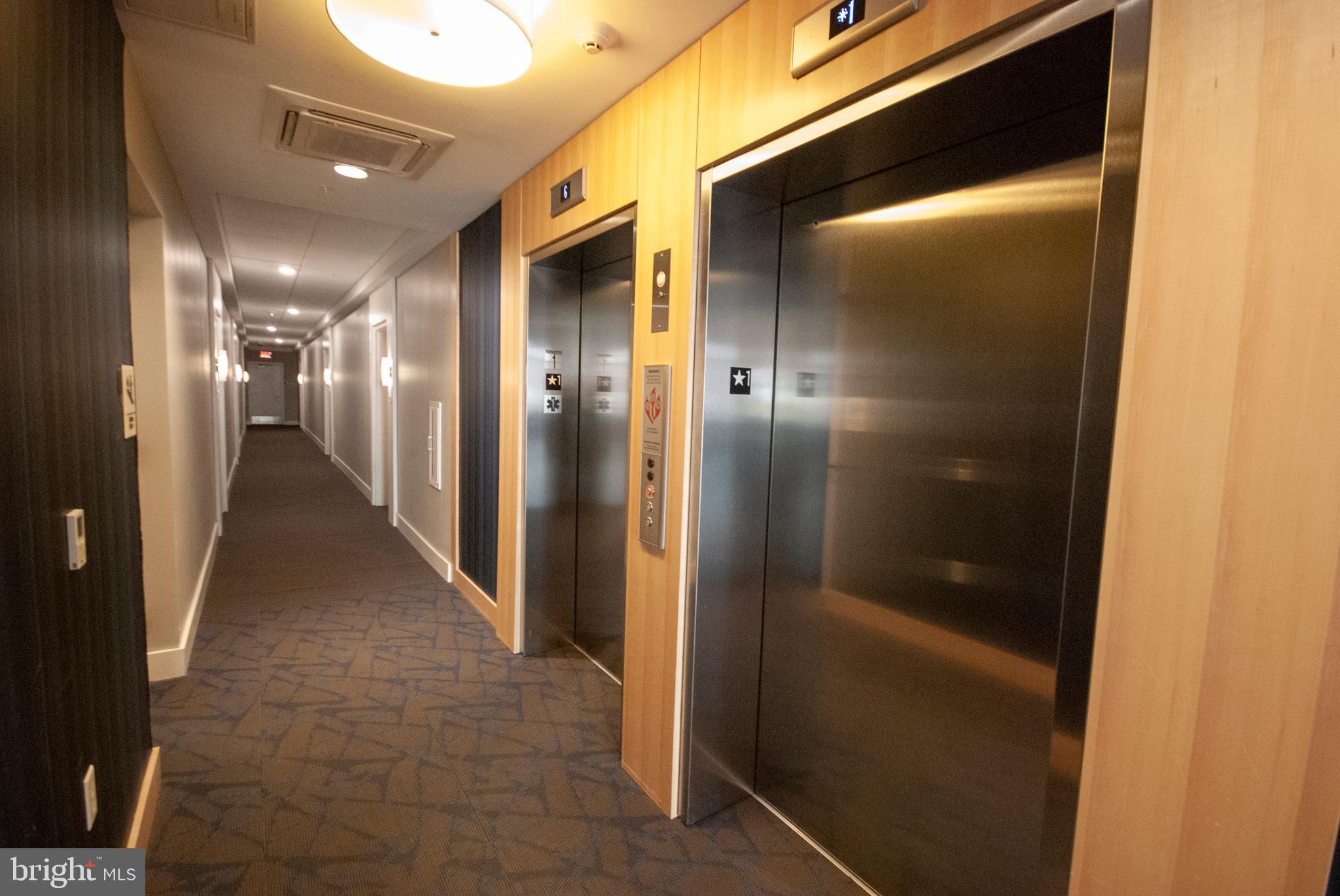 1320 Fenwick Lane, Unit 307 Silver Spring, MD 20910 - Photo 11 of 35 Elevators, Hallway