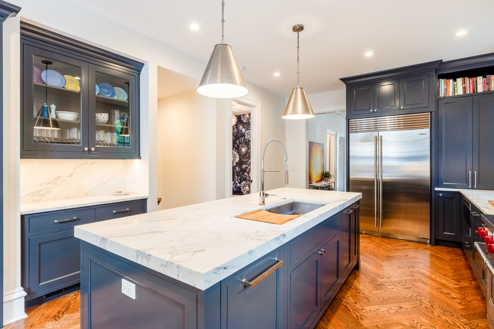558 West Belden Avenue Chicago, IL 60614 - Photo 26 of 62 a kitchen with stainless steel appliances granite countertop a sink a kitchen island a stove and a refrigerator