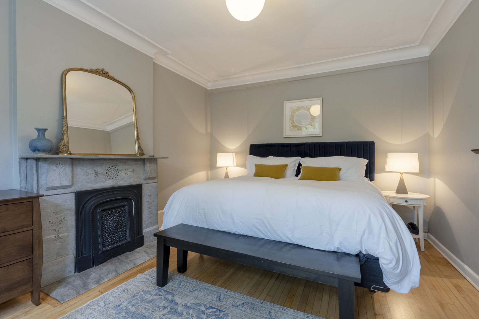 558 West Belden Avenue Chicago, IL 60614 - Photo 36 of 62 a bedroom with a bed and a fireplace