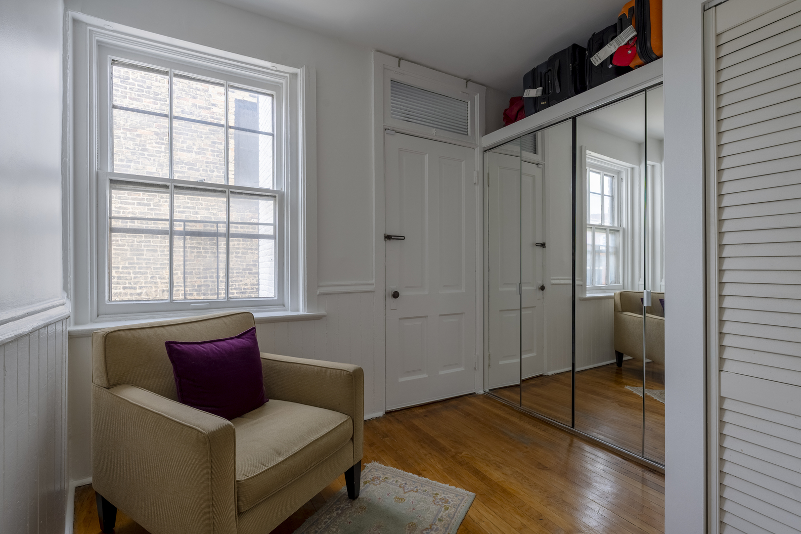558 West Belden Avenue Chicago, IL 60614 - Photo 44 of 62 a bedroom with a bed and a window
