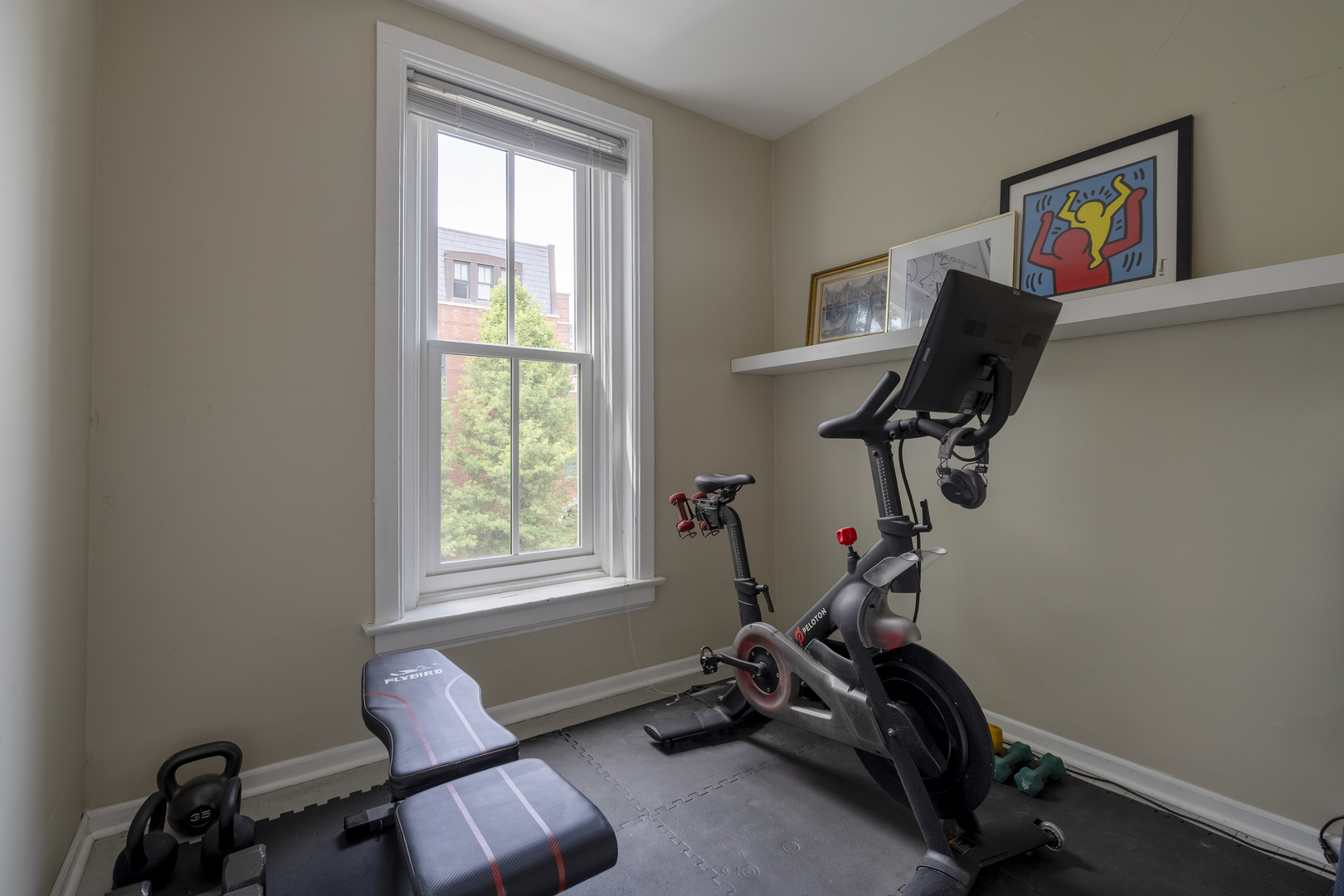 558 West Belden Avenue Chicago, IL 60614 - Photo 45 of 62 a room with gym equipment and a window