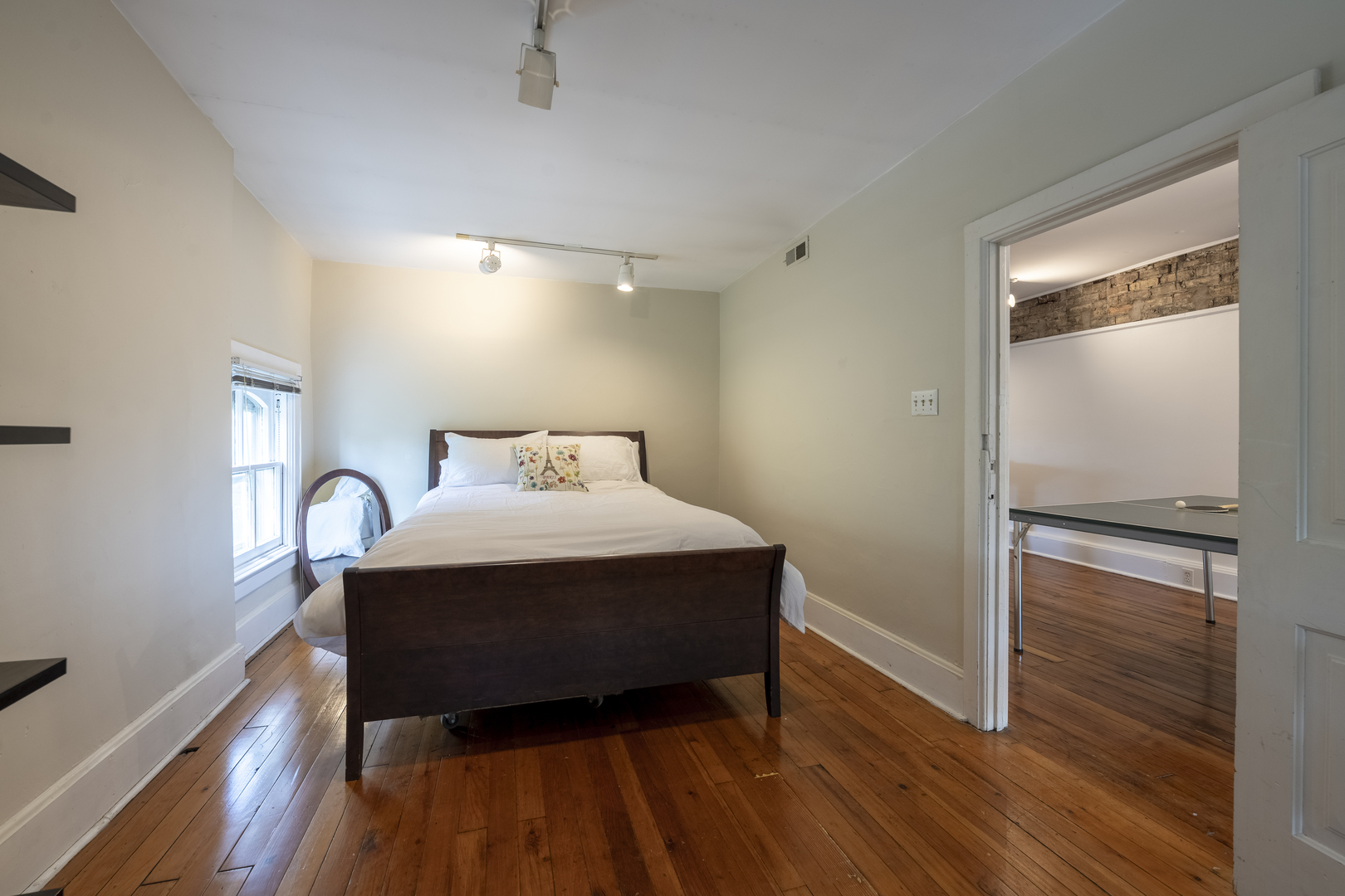 558 West Belden Avenue Chicago, IL 60614 - Photo 54 of 62 a bedroom with a bed and wooden floor