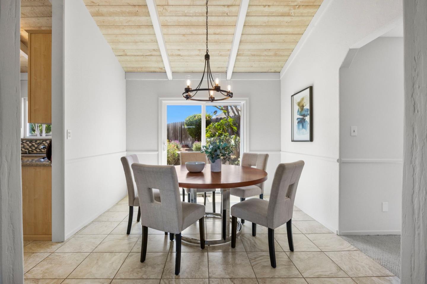 9310 Canyon Oak Road Salinas, CA 93907 - Photo 13 of 81 a dining room with furniture a chandelier and window