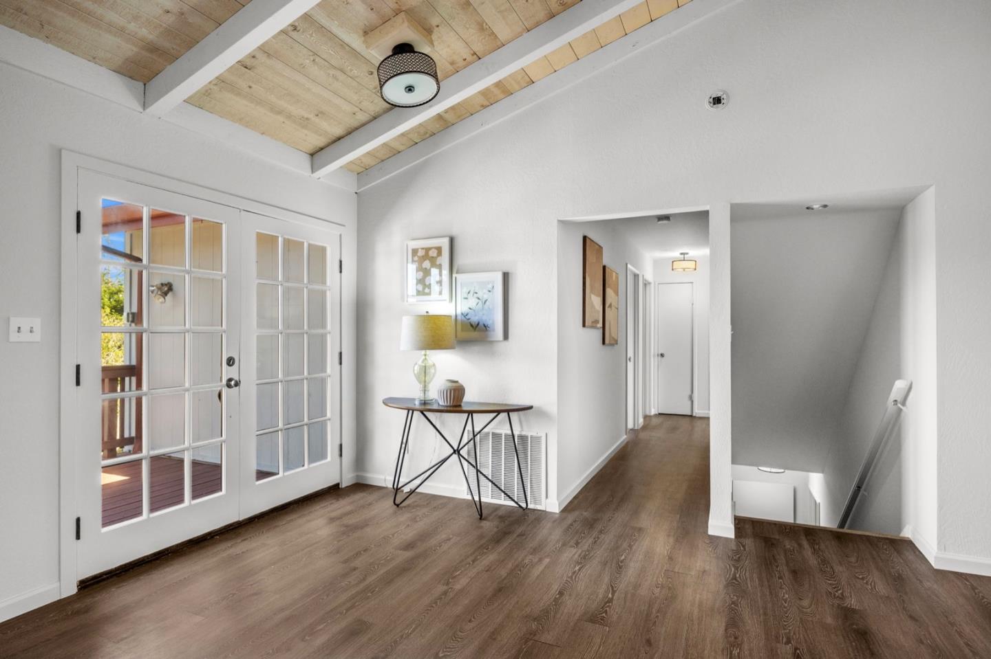 9310 Canyon Oak Road Salinas, CA 93907 - Photo 36 of 81 a view of a hallway with wooden floor and cabinet
