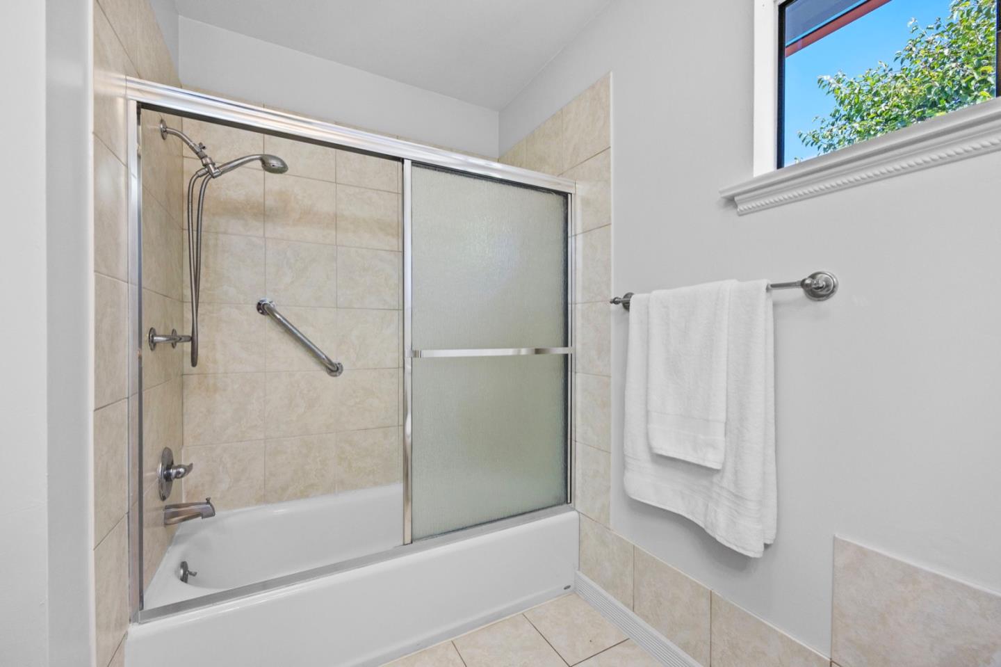 9310 Canyon Oak Road Salinas, CA 93907 - Photo 45 of 81 a bathroom with a glass shower door