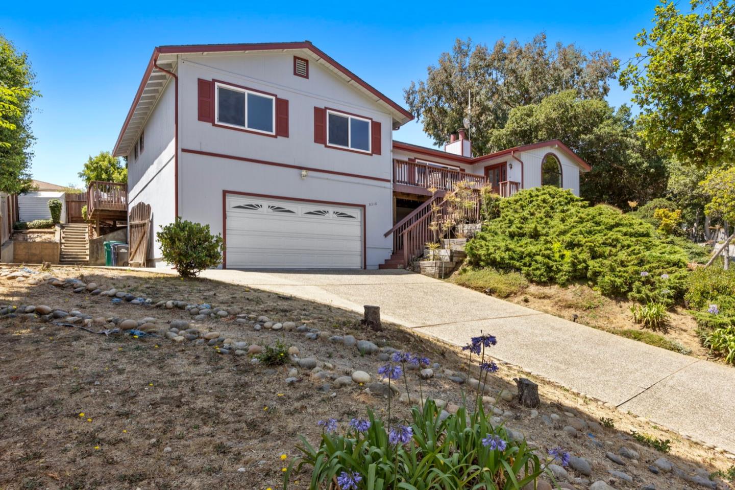 9310 Canyon Oak Road Salinas, CA 93907 - Photo 68 of 81 a front view of a house with a yard