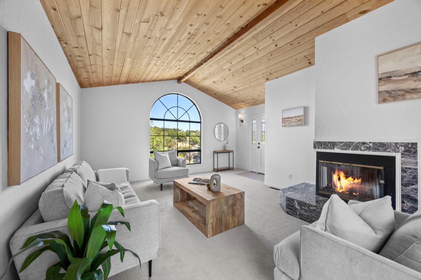 9310 Canyon Oak Road Salinas, CA 93907 - Photo 8 of 81 a living room with furniture and a fireplace