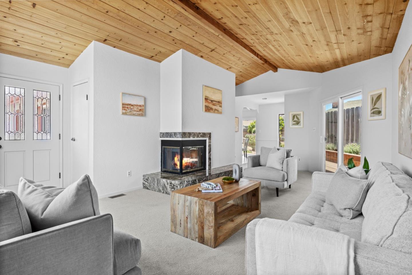 9310 Canyon Oak Road Salinas, CA 93907 - Photo 9 of 81 a living room with furniture and a fireplace