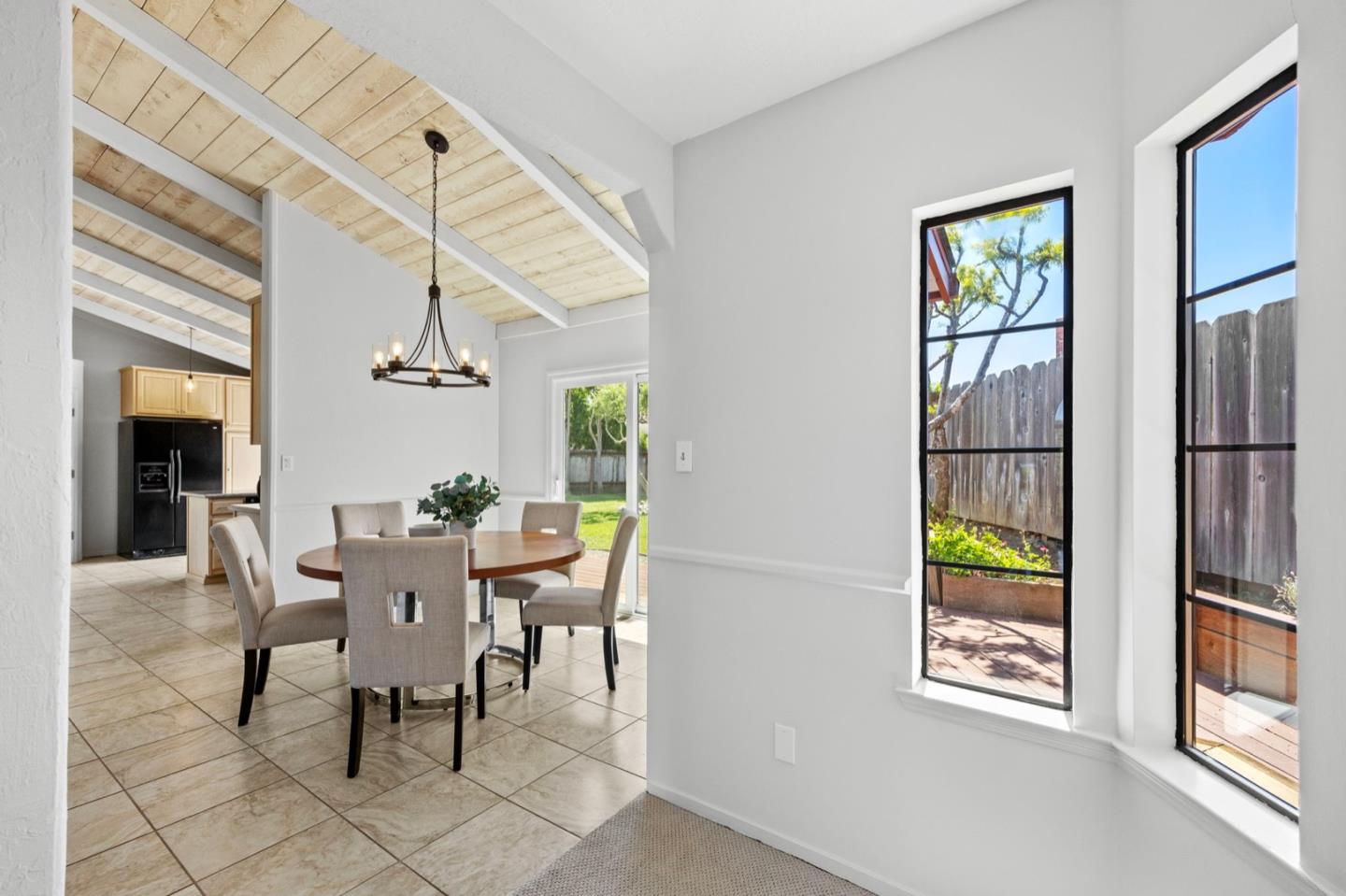 9310 Canyon Oak Road Salinas, CA 93907 - Photo 10 of 81 a view of a dining room with furniture window and wooden floor