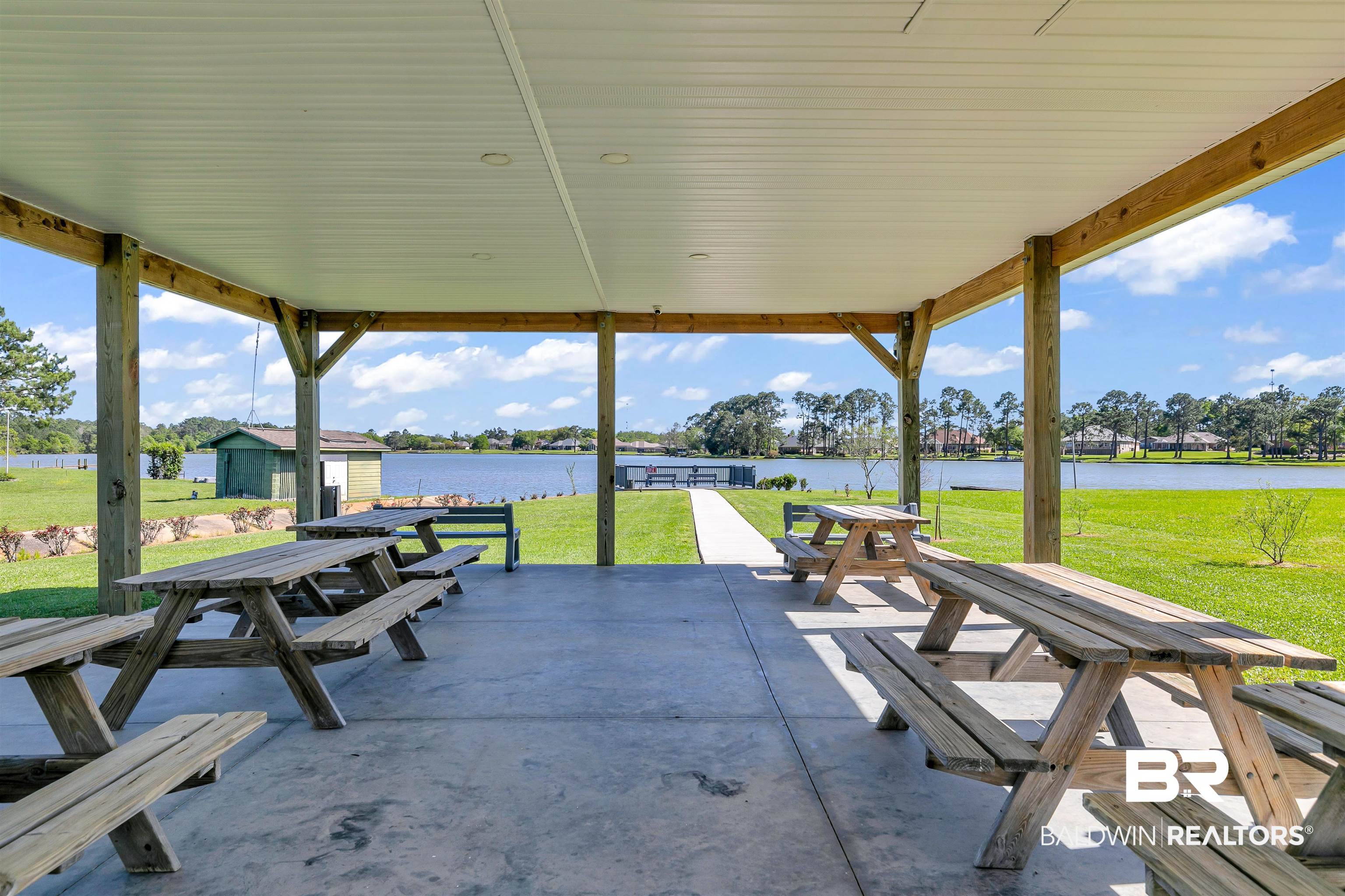 10140 Chipper Lane Foley, AL 36535 - Photo 66 of 72 View of patio / terrace featuring a water view
