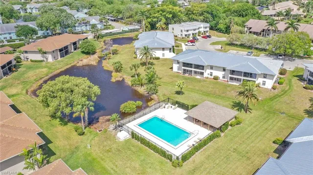 an aerial view of a house with a garden