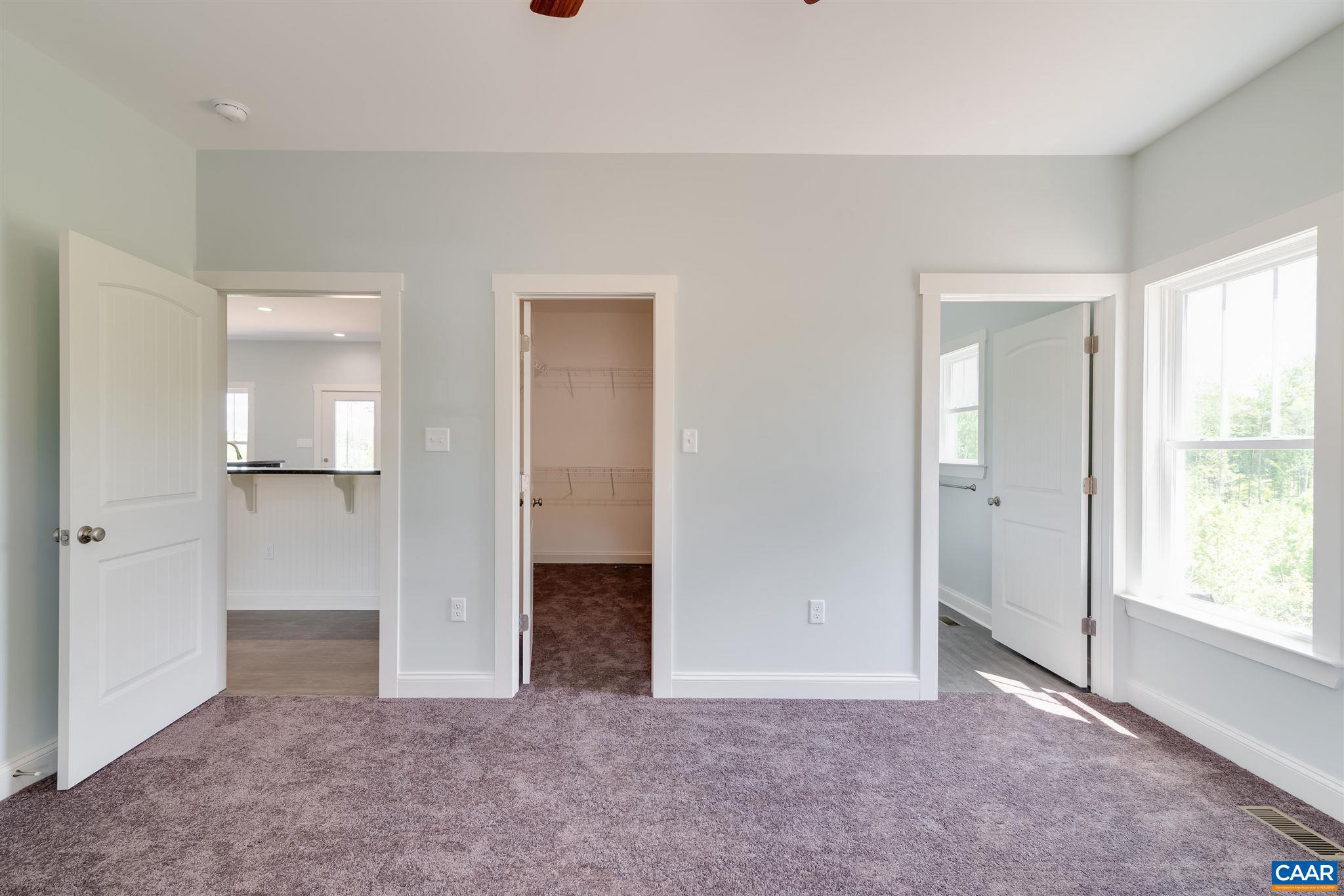 6008 Old Columbia Road Columbia, VA 23038 - Photo 13 of 23 an empty room with window and bathroom