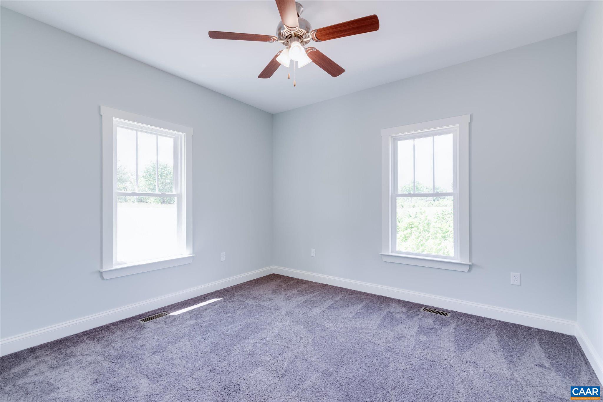 6008 Old Columbia Road Columbia, VA 23038 - Photo 20 of 23 an empty room with windows and fan