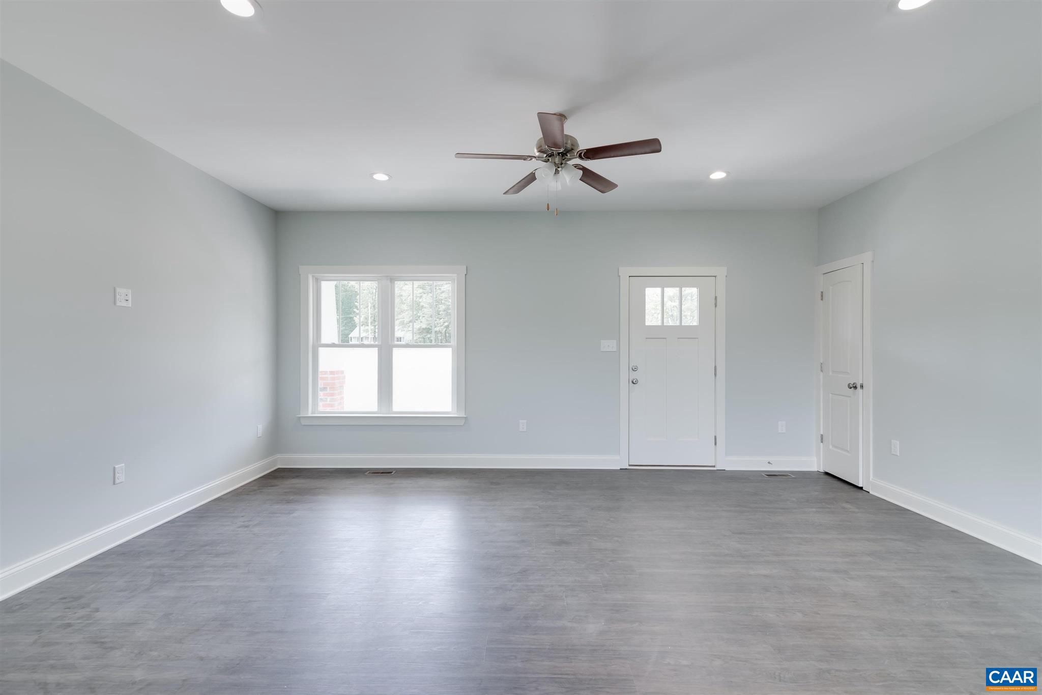 6008 Old Columbia Road Columbia, VA 23038 - Photo 4 of 23 wooden floor in an empty room with a window