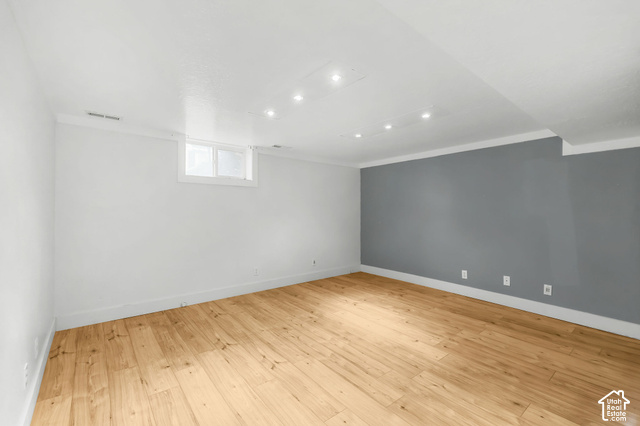 154 South State Street Morgan, UT 84050 - Photo 14 of 25 Spacious room featuring wood-finish flooring, recessed lighting, and a window for natural light