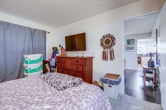 a bedroom with a bed and furniture