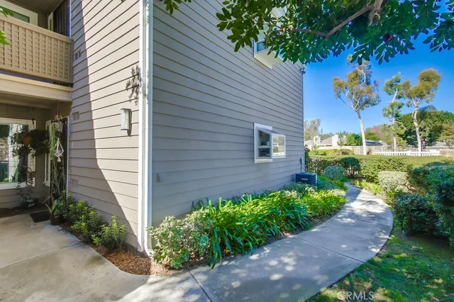 a view of a back yard of the house