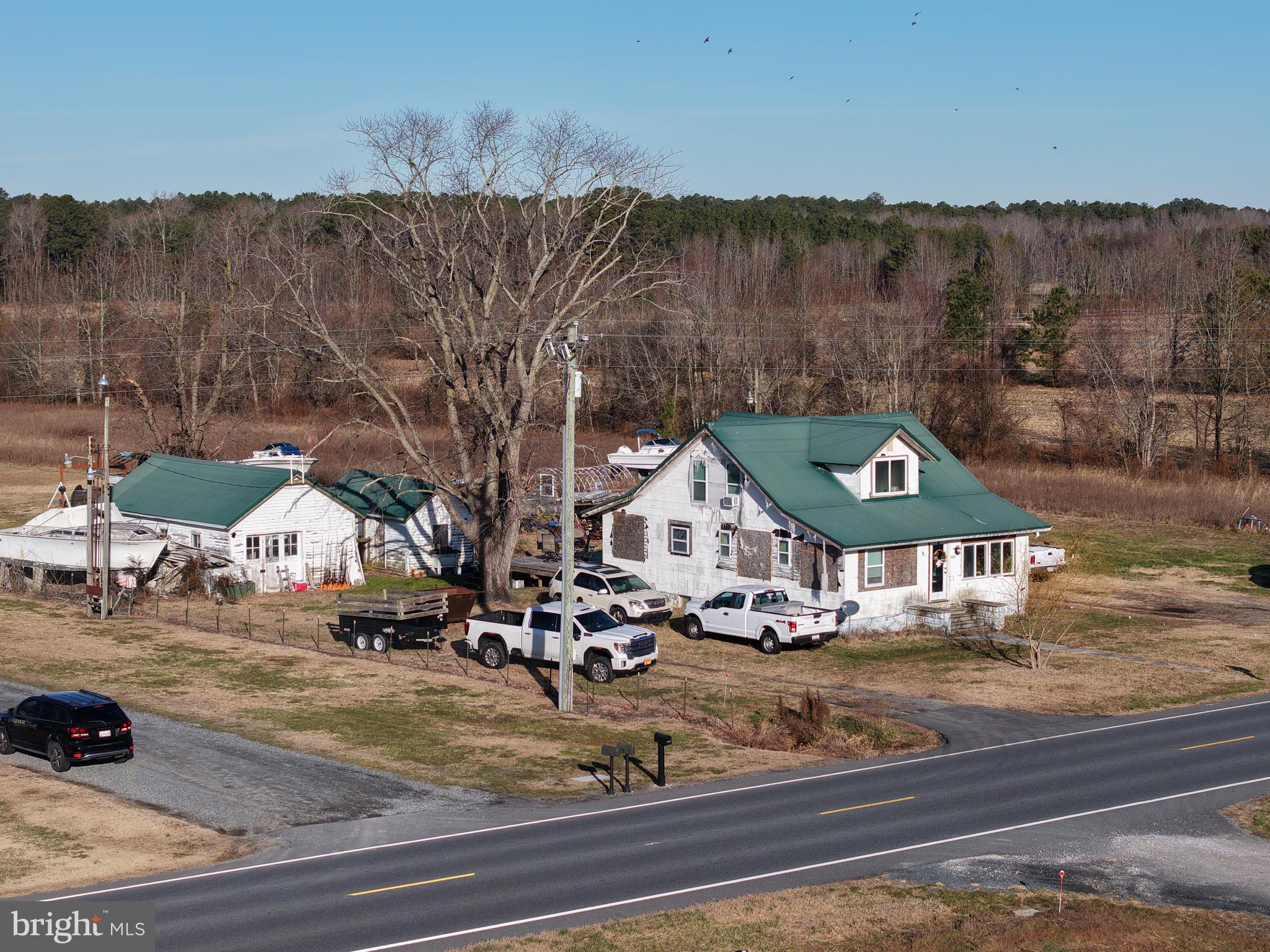 8304-8344 Gumboro Road Pittsville, MD 21850 - Photo 3 of 7 a view of a town with mountains in the background