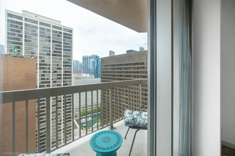 a view of balcony with furniture