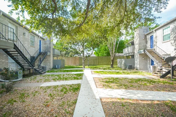 a view of a yard in front of house