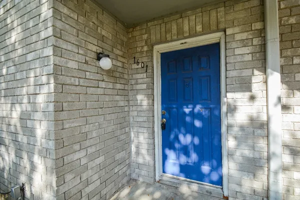 an empty room with fireplace