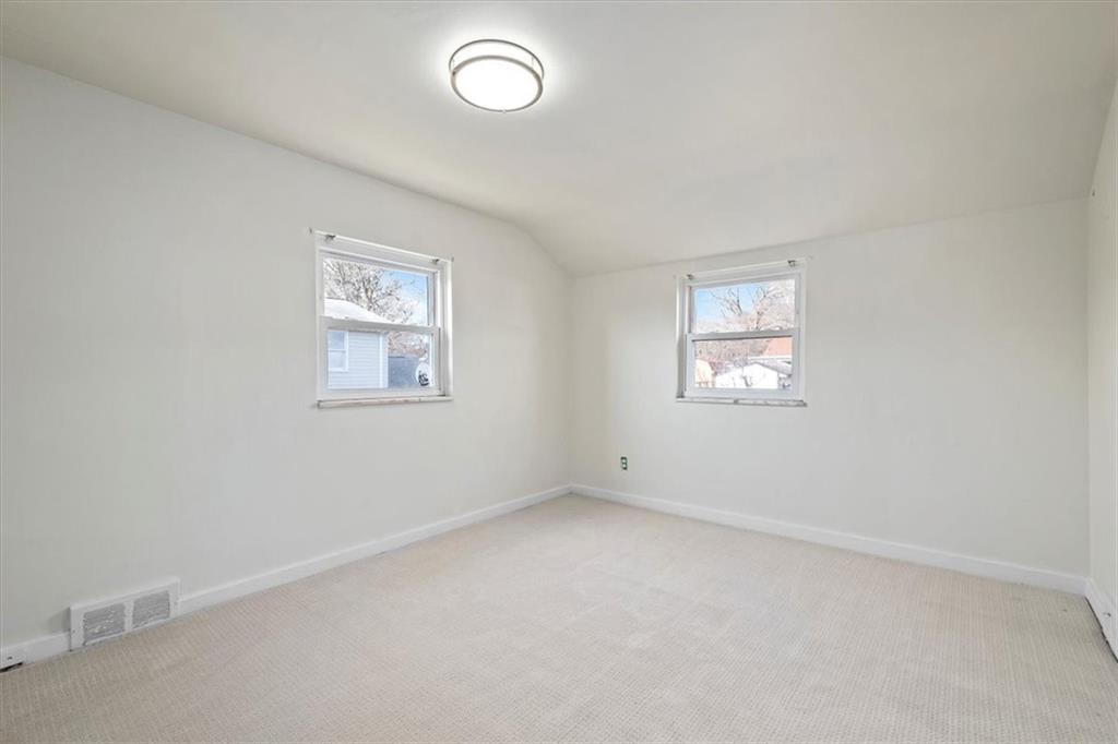 504 Nichols Road Pittsburgh, PA 15237 - Photo 15 of 25 an empty room with windows