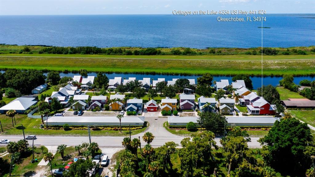 4334 Highway 441, Unit 24 Okeechobee, FL 34974 - Photo 11 of 40 a view of a house with a yard
