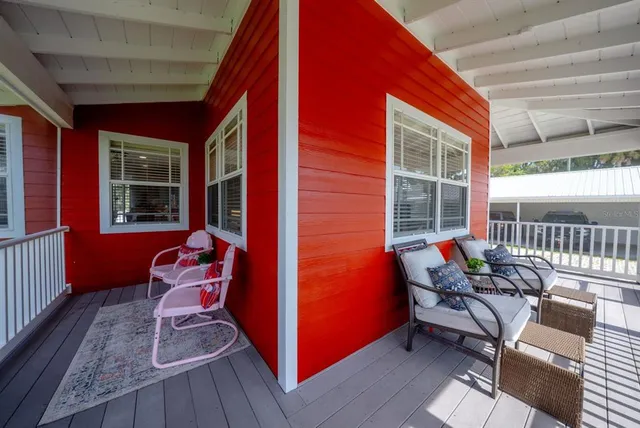 a backyard of a house with seating space