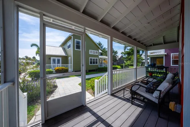 a balcony with wooden floor