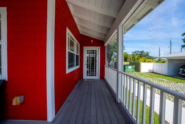 a view of a balcony with city view