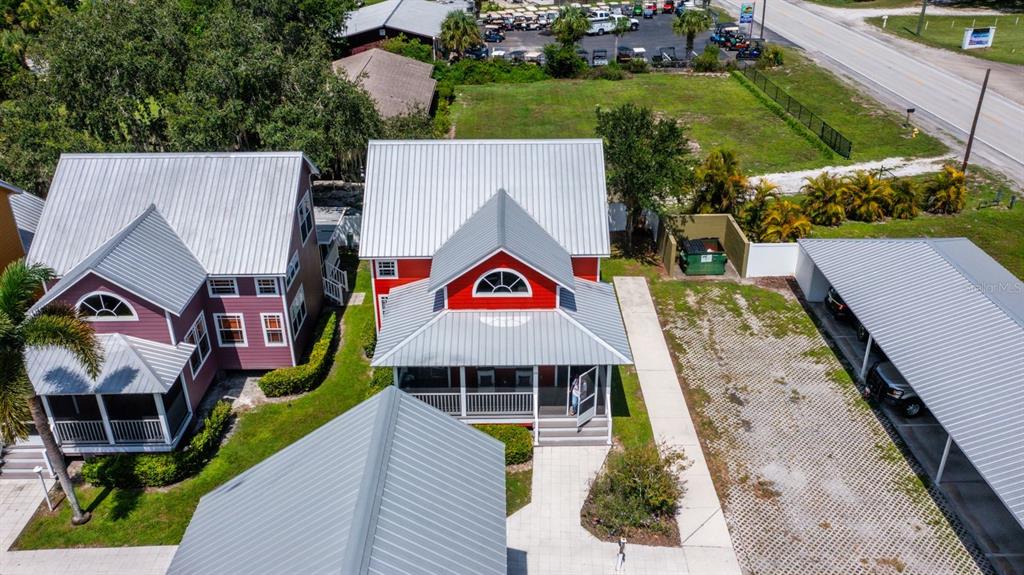 4334 Highway 441, Unit 24 Okeechobee, FL 34974 - Photo 5 of 40 an aerial view of a house with a swimming pool