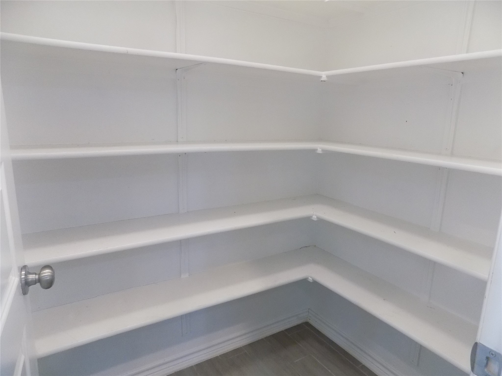 1133 Capra Lane Leander, TX 78641 - Photo 16 of 25 Ample shelving in this well-organized pantry provides abundant storage for all culinary essentials.