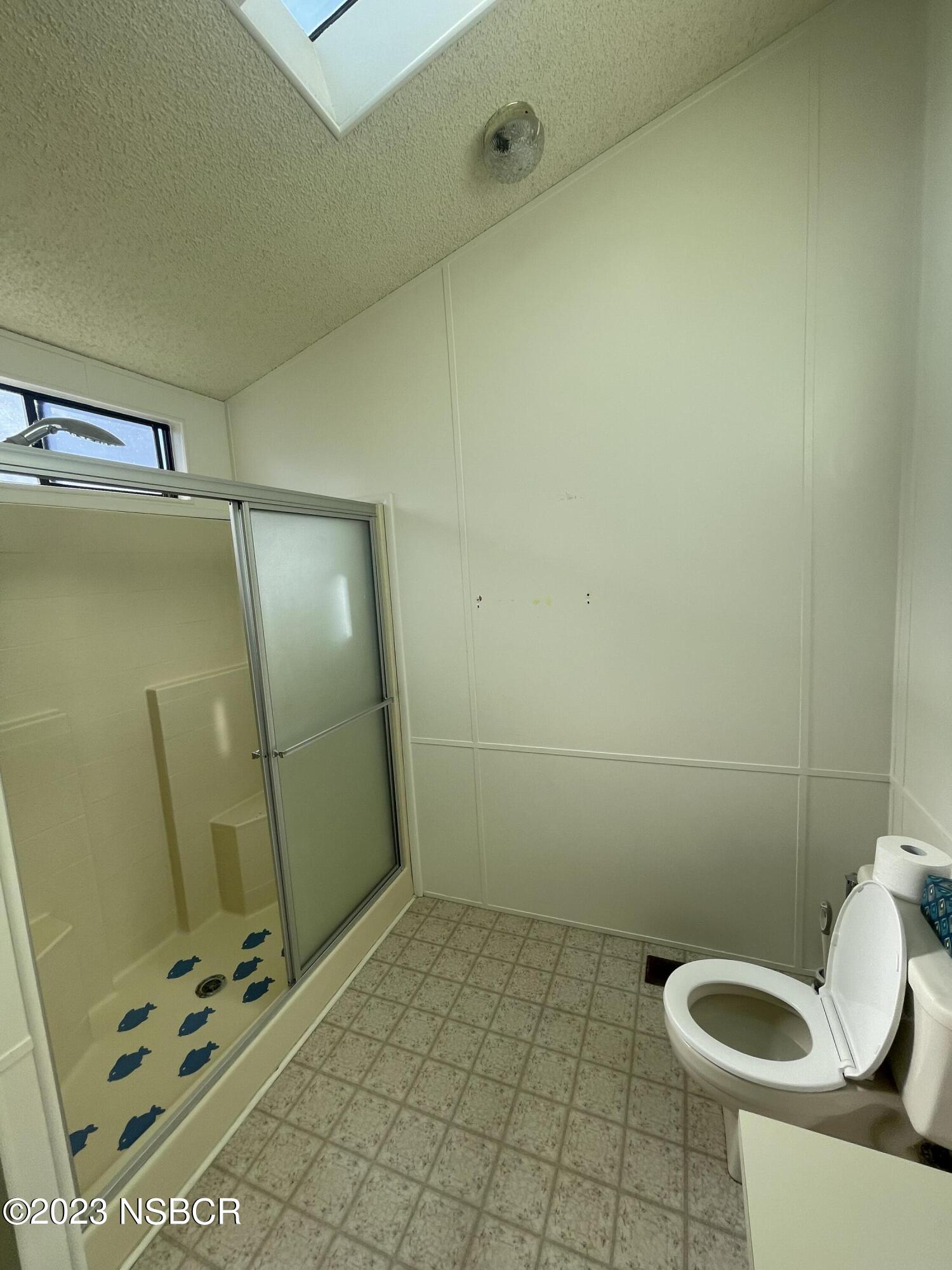 1317 V Street, Unit 114 Lompoc, CA 93436 - Photo 12 of 24 a bathroom with a shower