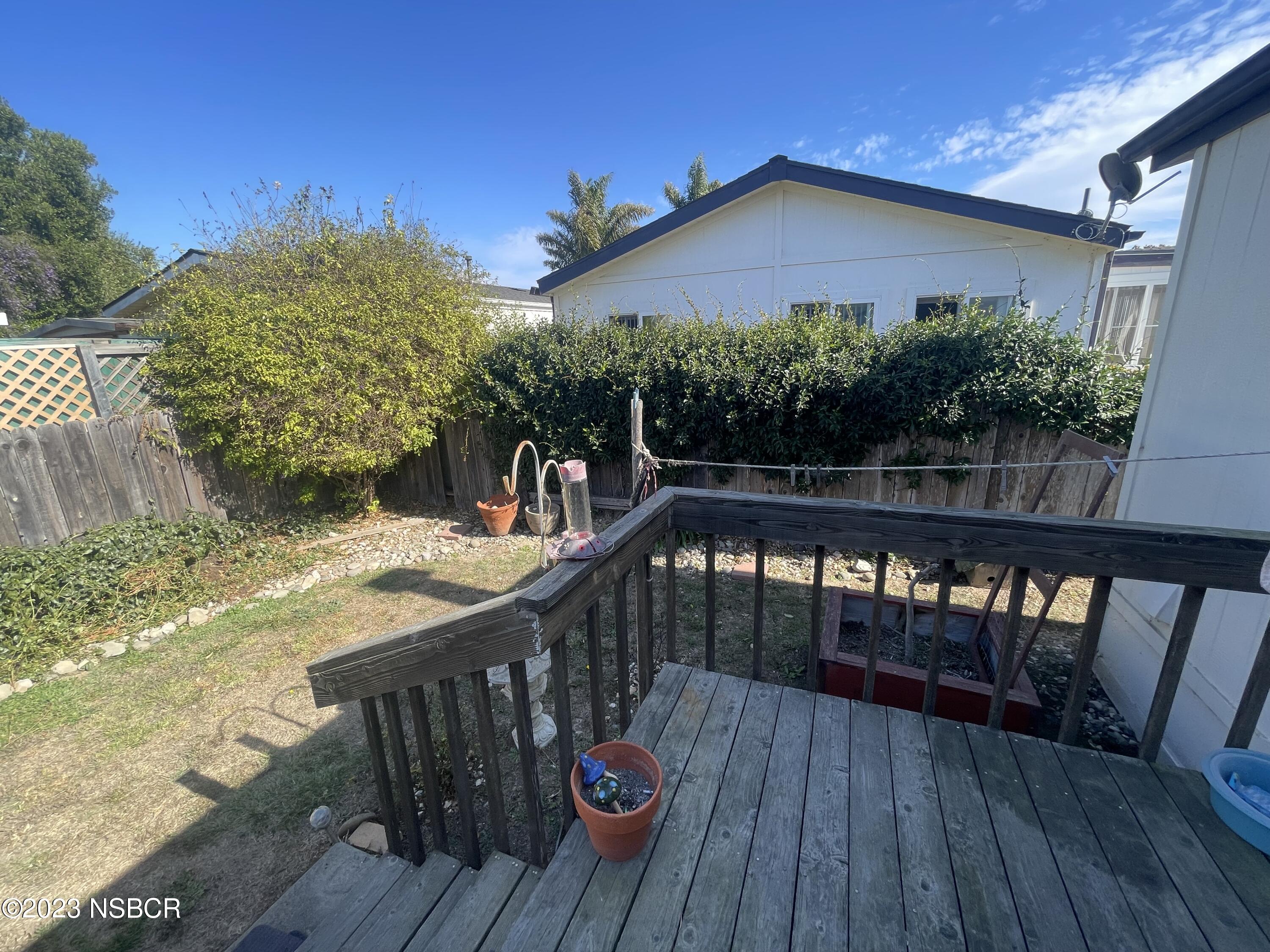 1317 V Street, Unit 114 Lompoc, CA 93436 - Photo 22 of 24 a balcony view with a seating space