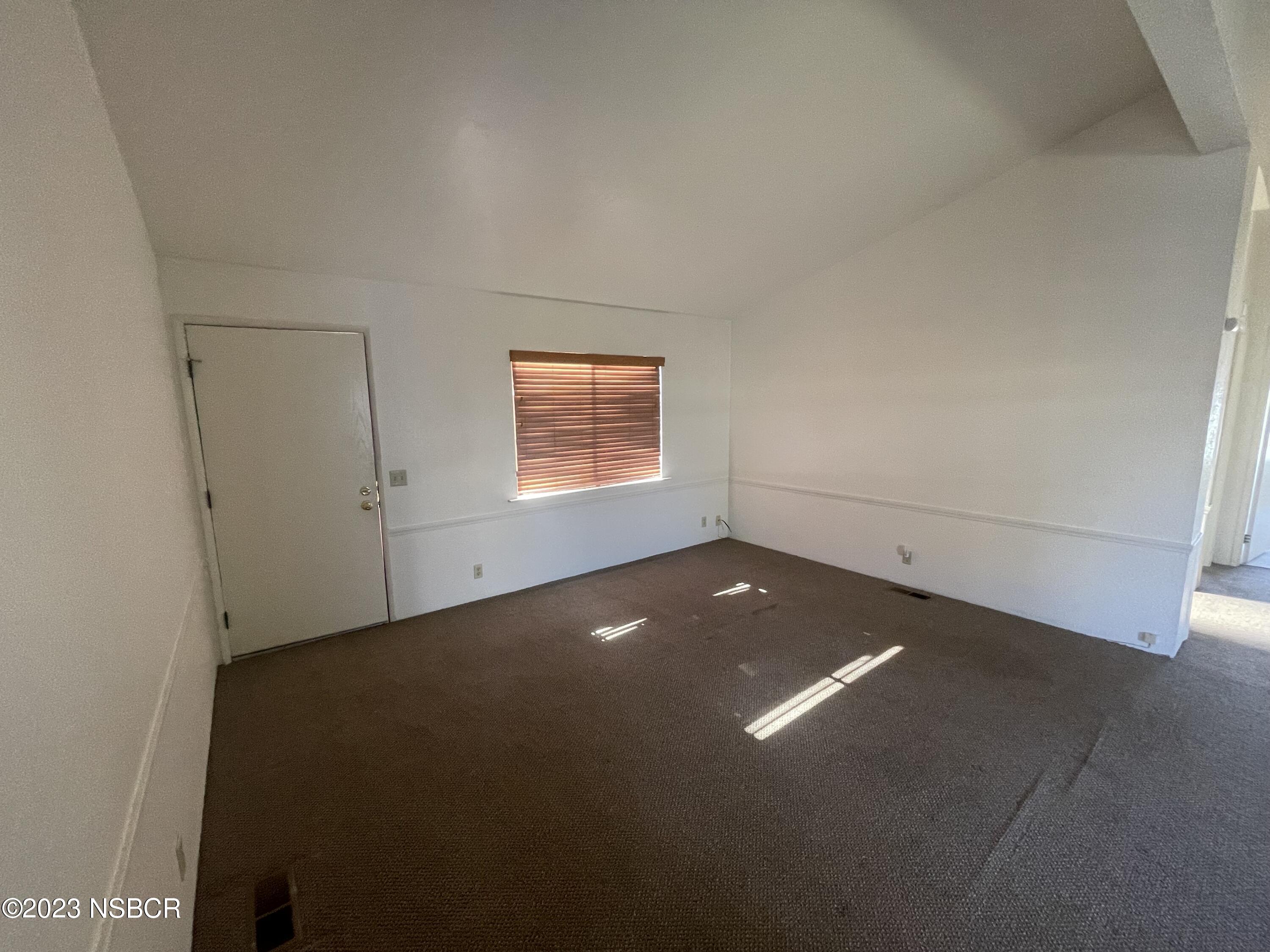 1317 V Street, Unit 114 Lompoc, CA 93436 - Photo 3 of 24 an empty room with a empty space