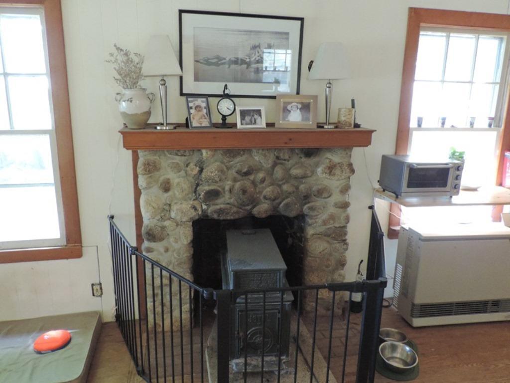 18 Panther Pond Pines Road Raymond, ME 04071 - Photo 6 of 17 Stone fireplace in Livingroom