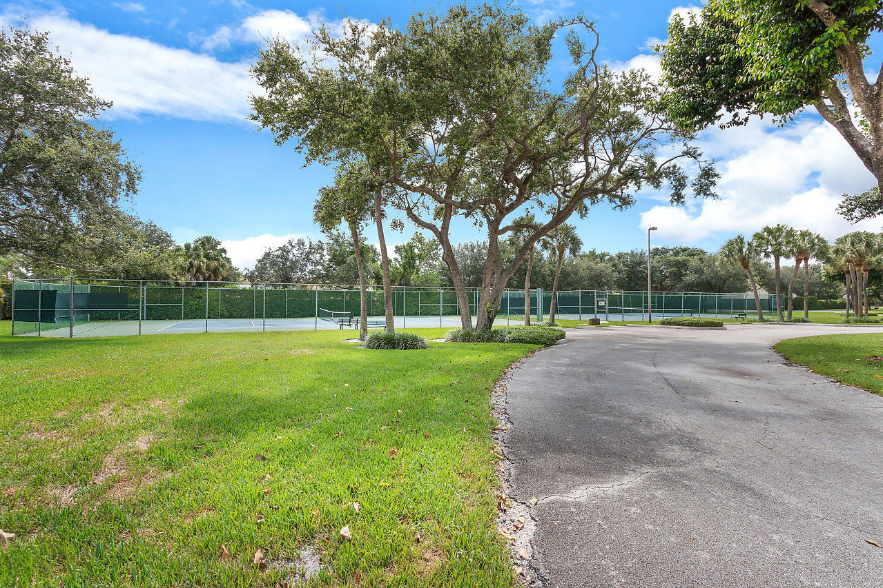 3050 Norwood Place, Unit N112 Boca Raton, FL 33431 - Photo 22 of 23 a view of a park