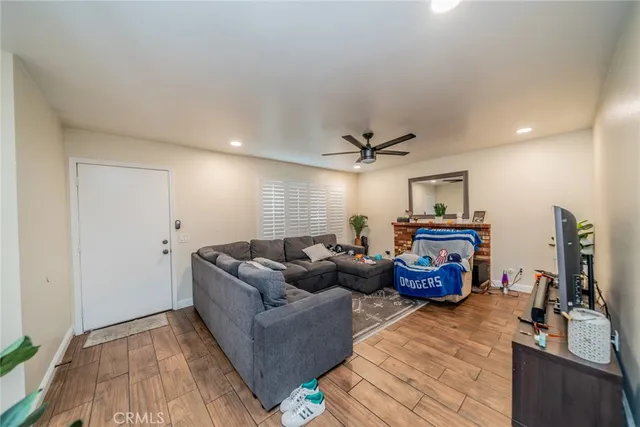 a kitchen with stainless steel appliances a refrigerator and a stove top oven